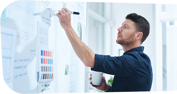 Team planning SEO strategy on whiteboard